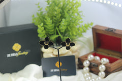 Black flower stud earrings