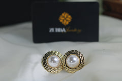 Gold toned white big pearl stud earring