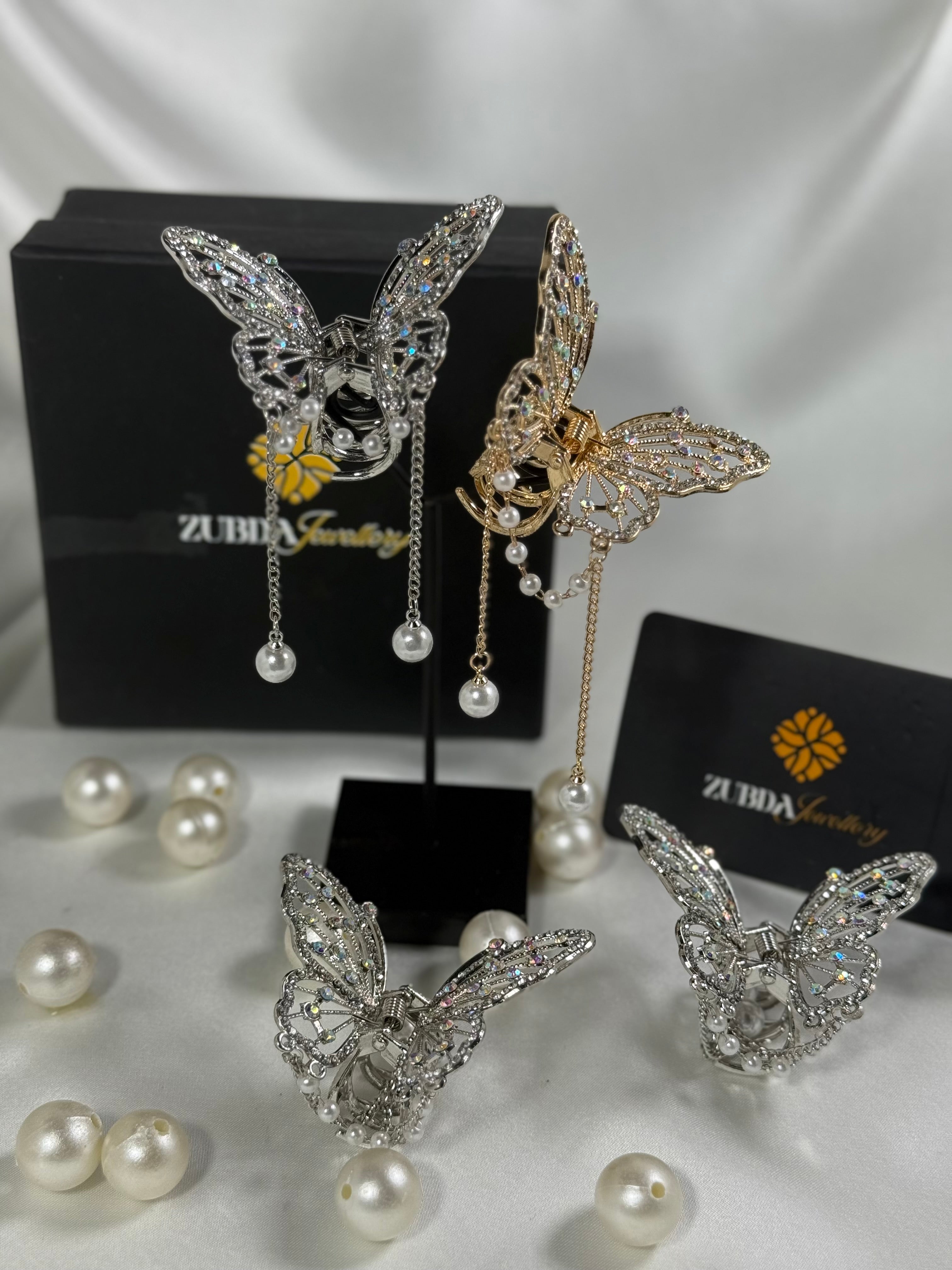 Pearly butterfly catcher