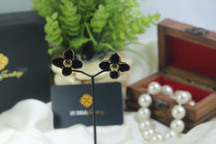 Black flower stud earrings