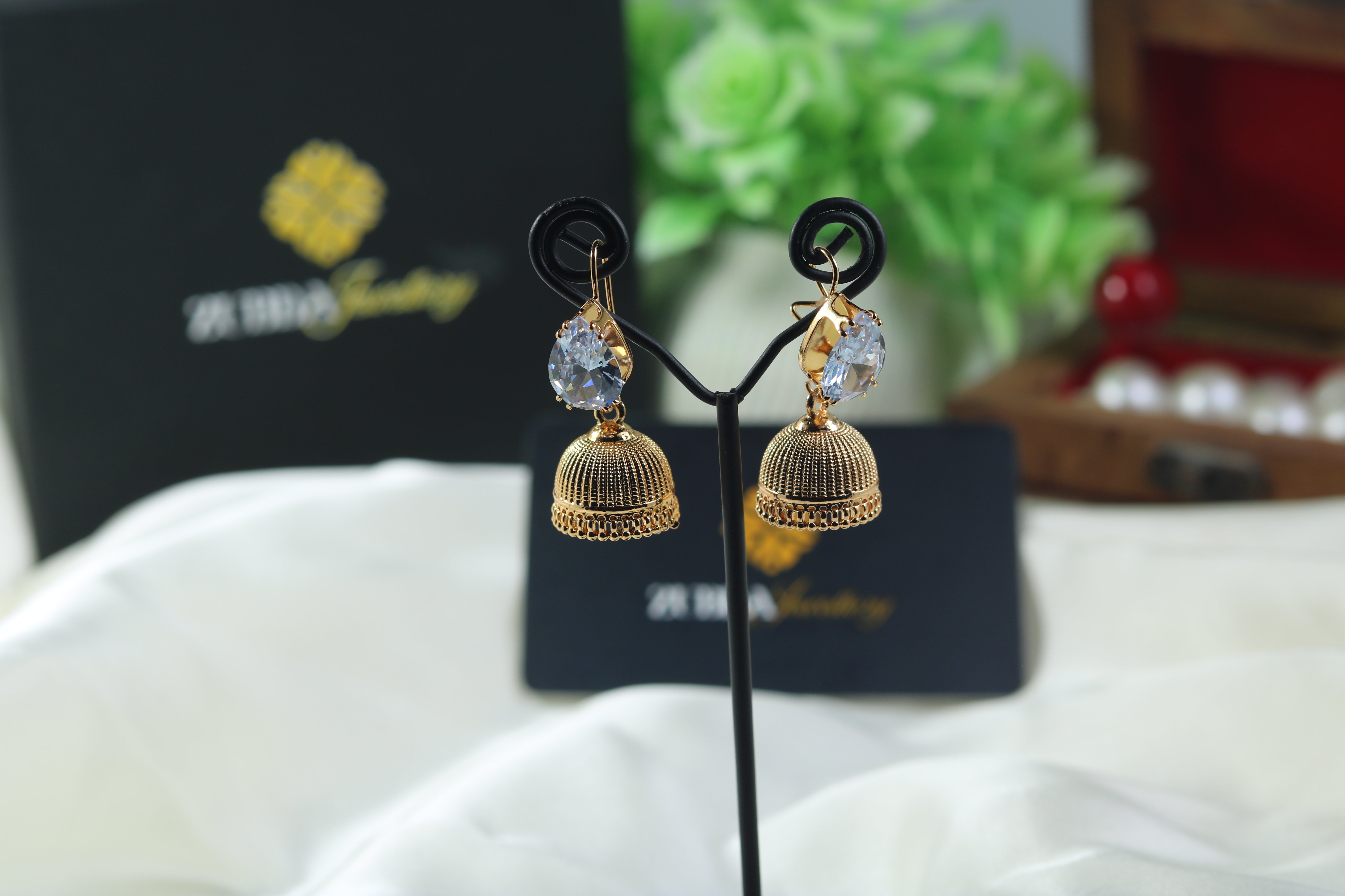 Gold plated filigree jumka with pearls